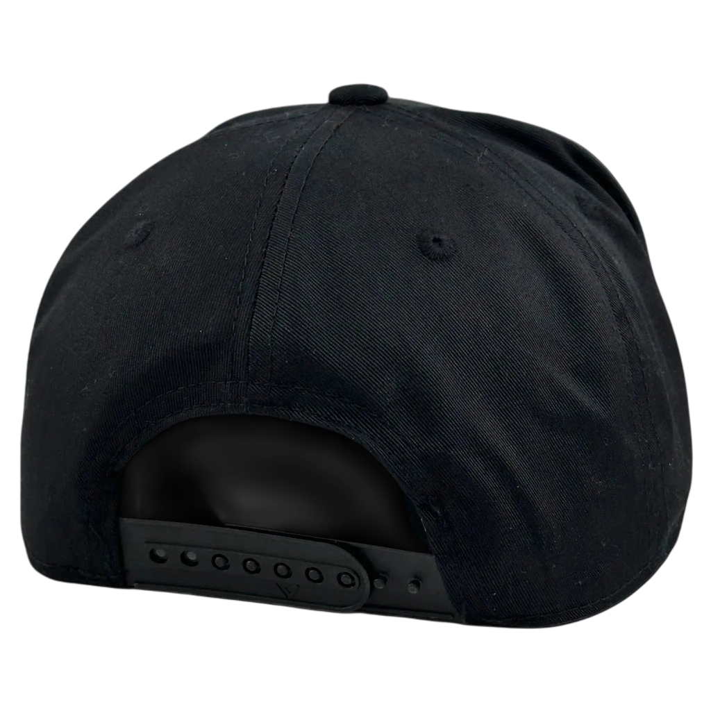 The back view of a black snapback cap with an adjustable plastic closure, shown against a solid black background.