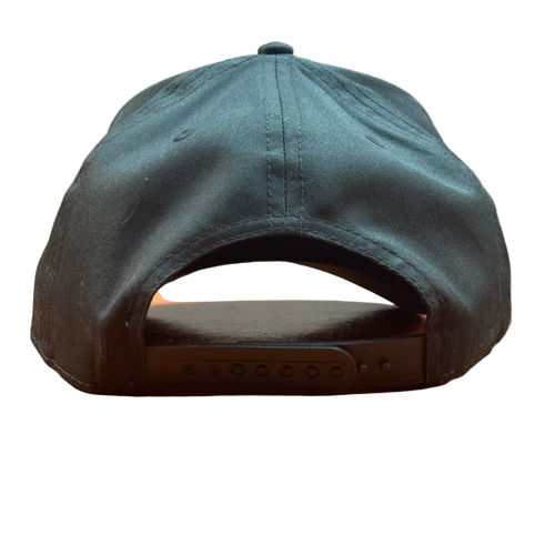 Back view of a black snapback baseball cap.